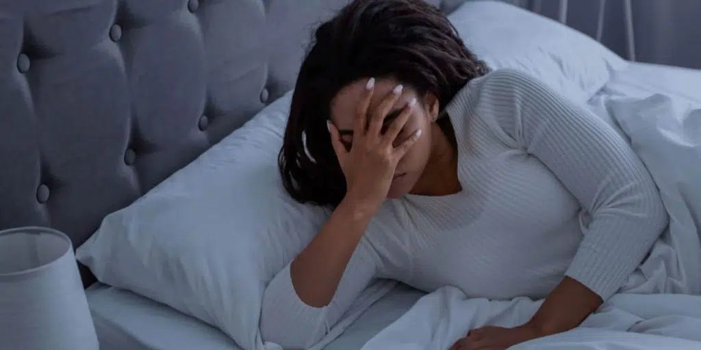 a woman suffering from sleep deprivation due to sleep apnea need a treatment at smith dentalworks