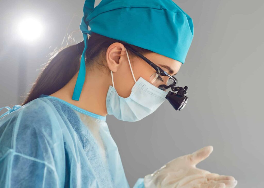 a smith dentalworks dentist examining patient tooth to debunk common dental care myths